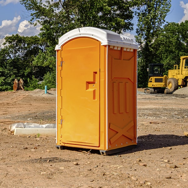 how often are the portable restrooms cleaned and serviced during a rental period in Baldwin Harbor